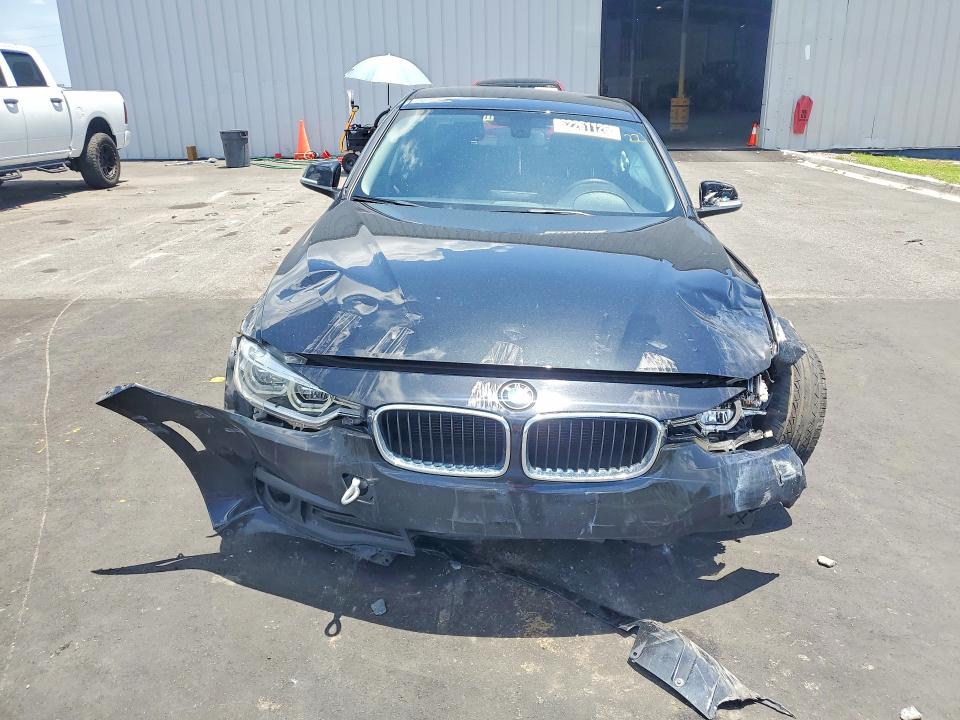 2018 BMW 3 series VIN WBA8E1G52JNU90308 COPART salvage auction — FRONT END, FL - CERTIFICATE OF TITLE, sold $475 on 2026-08-06 (photo 5)