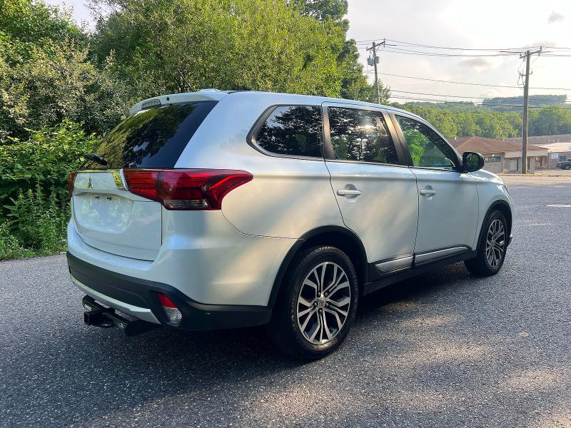 2016 Mitsubishi Outlander VIN JA4AZ3A34GZ037976 COPART salvage auction — NORMAL WEAR, Salvage Title, sold $2,800 on 2026-07-17 (photo 4)
