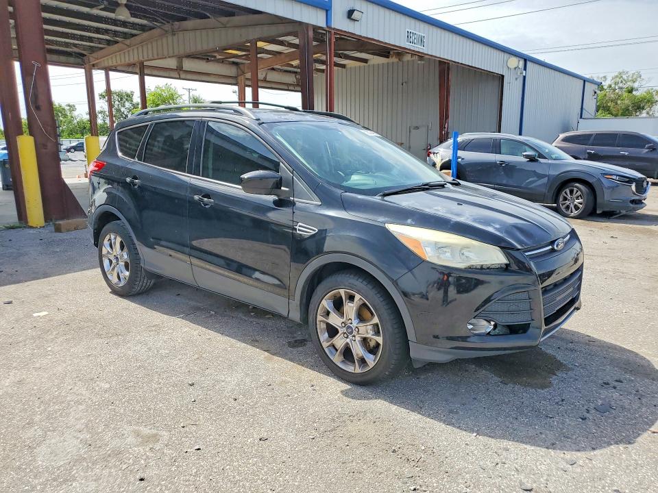 2016 Ford Escape VIN 1FMCU0GX5GUC20236 COPART salvage auction — SIDE, Fl - Cert Of Title Slvg Rebuildable, sold $850 on 2026-07-31 (photo 4)
