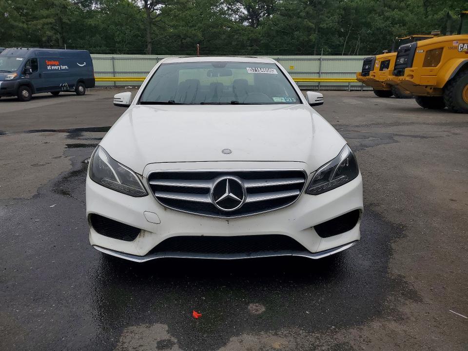 2014 Mercedes-benz E-klasse VIN WDDHF5KBXEA977554 COPART salvage auction — NORMAL WEAR, Wv - Certificate Of Title, sold $100 on 2026-07-28 (photo 5)