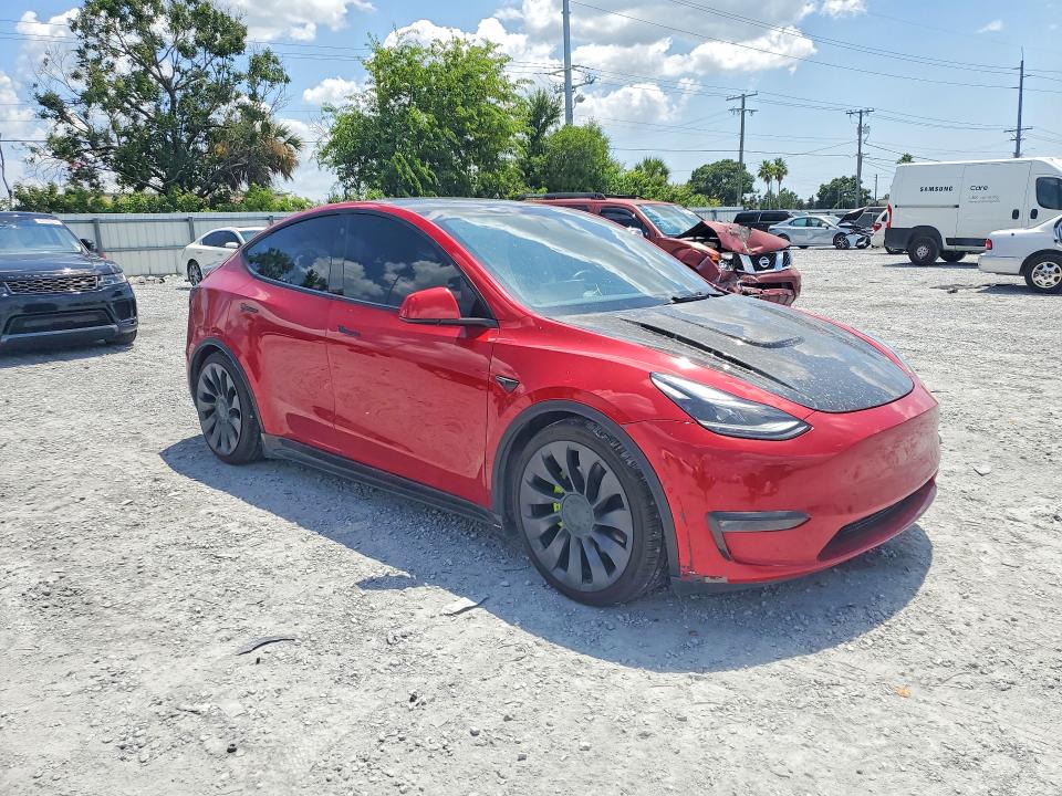 2021 Tesla Model y VIN 5YJYGDEF7MF197484 COPART salvage auction — MINOR DENT/SCRATCHES, Fl - Cert Of Title-Rebuilt, sold $4,600 on 2026-07-28 (photo 4)