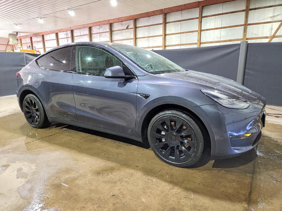 2022 Tesla Model y VIN 7SAYGDEE0NF386103 COPART salvage auction — MINOR DENT/SCRATCHES, OH - CERT OF TITLE-REPOSSESSION, sold $7,400 on 2026-09-08 (photo 4)