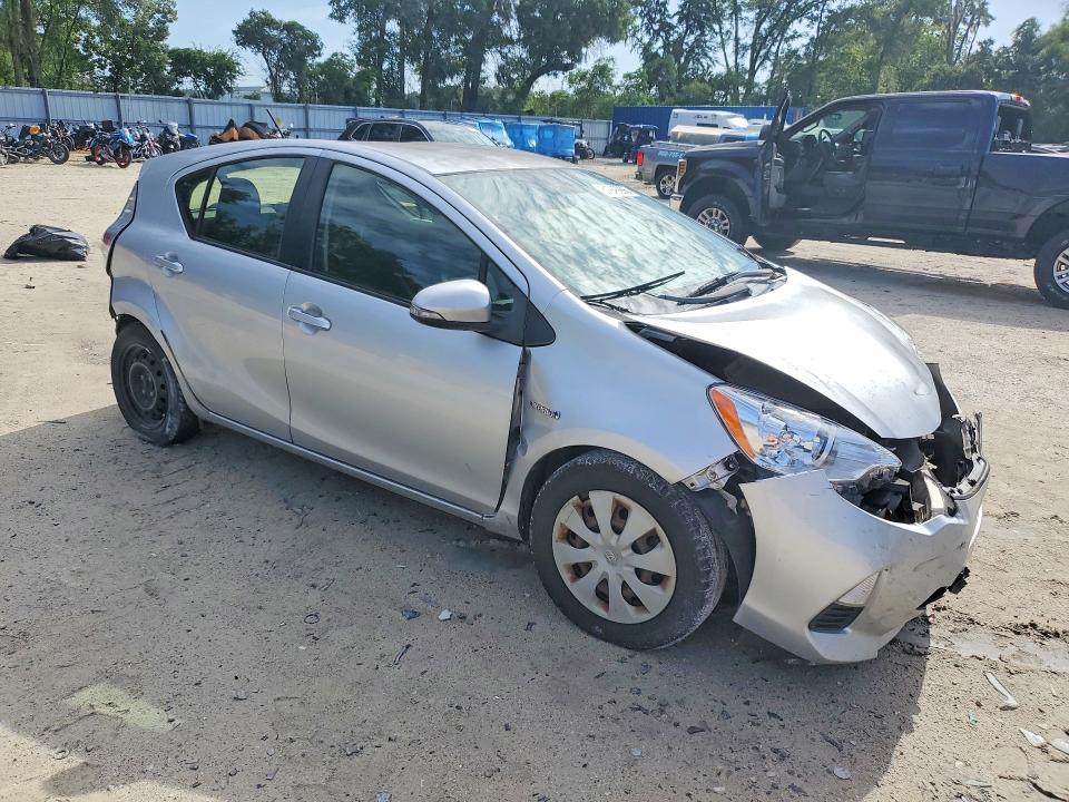 2013 Toyota Prius c VIN JTDKDTB3XD1545029 COPART salvage auction — FRONT END, FL - CERT OF TITLE SLVG REBUILDABLE, sold $375 on 2026-07-28 (photo 4)