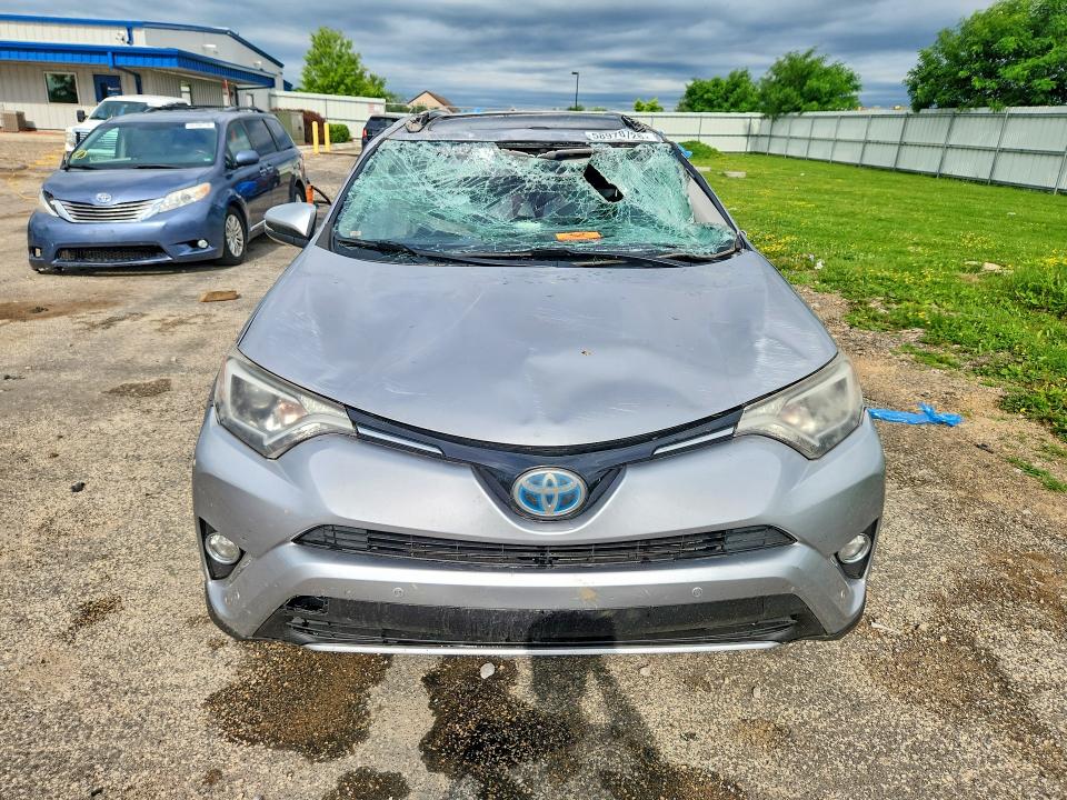 2017 Toyota Rav4 hybrid VIN JTMRJREV7HD101750 COPART salvage auction — ALL OVER, Wi - Junked Vehicle Bill Of Sale, sold $575 on 2026-07-28 (photo 5)