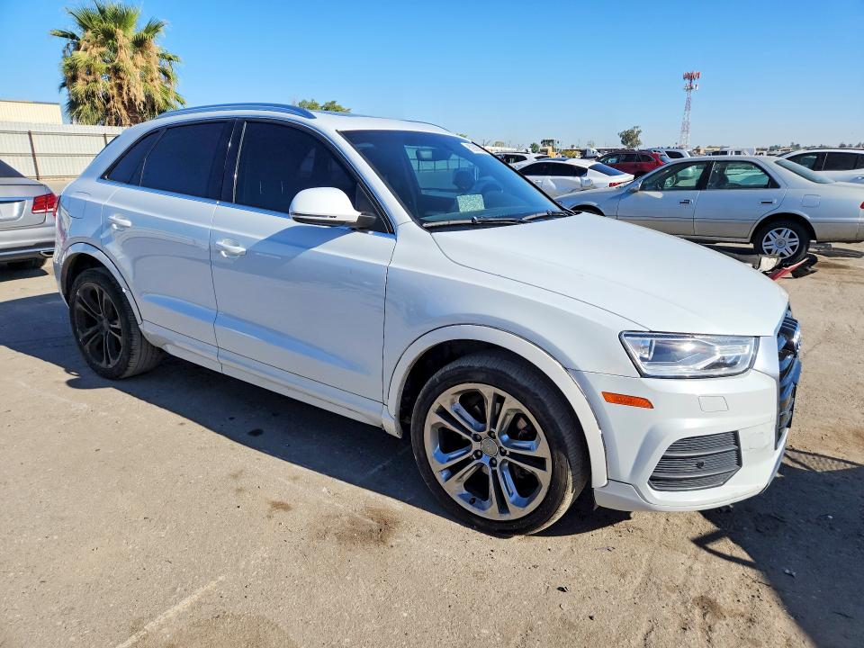 2017 Audi Q3 VIN WA1HCCFS4HR006342 COPART salvage auction — MINOR DENT/SCRATCHES, Ca - Dlr/Dis/Exp Only Salvage Title, sold $500 on 2026-07-31 (photo 4)