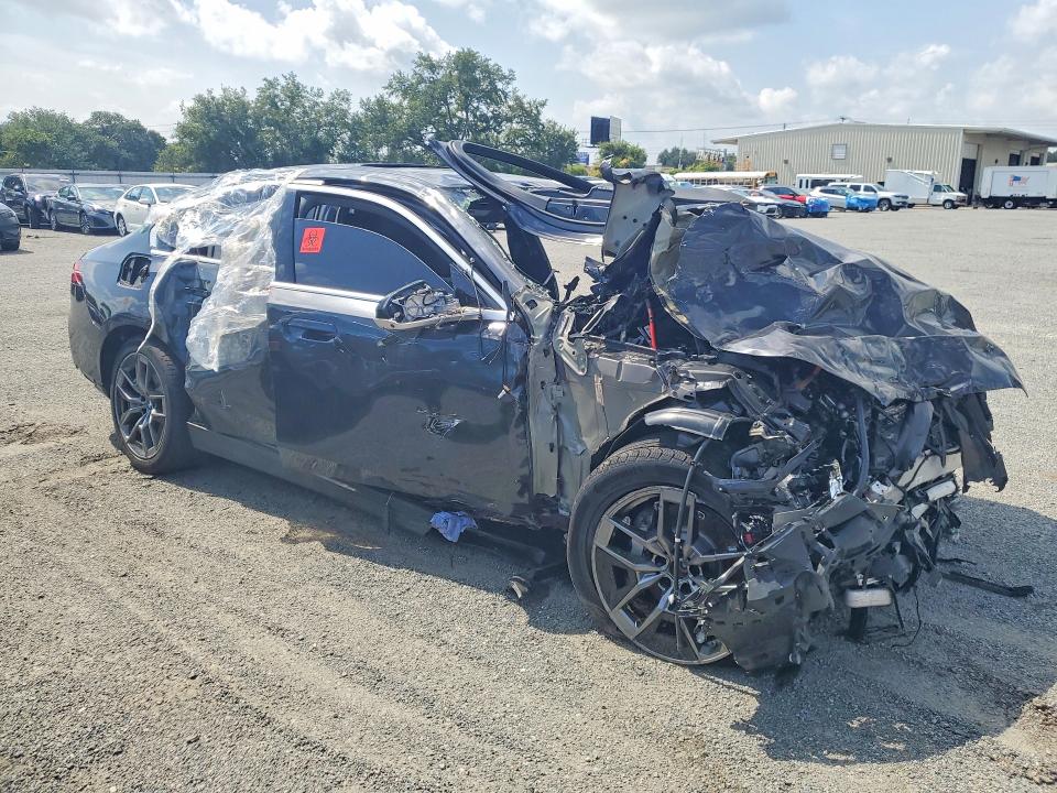 2027 BMW 5 series VIN WBA53FJ04VCY26013 COPART salvage auction — FRONT END, FL - CERTIFICATE OF DESTRUCTION, sold $2,250 on 2026-08-10 (photo 4)