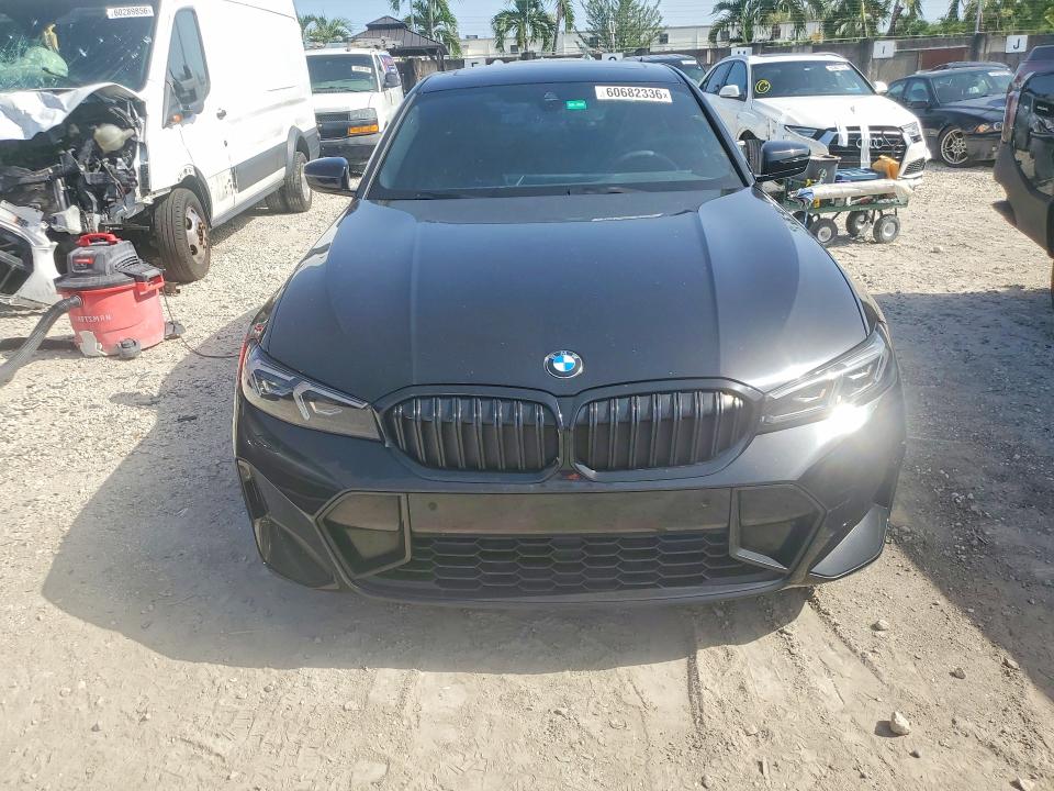 2023 BMW 3er VIN 3MW69FF08P8C91855 COPART salvage auction — REAR END, Fl - Cert Of Title Slvg Rebuildable, sold $23,200 on 2026-08-28 (photo 5)