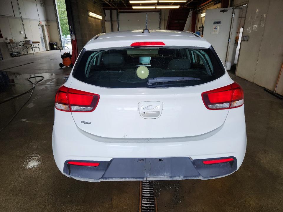 2023 Kia Rio VIN 3KPA25AD5PE613584 COPART salvage auction — NORMAL WEAR, AK - CERTIFICATE OF VEHICLE TITLE, sold $7,200 on 2026-07-28 (photo 6)
