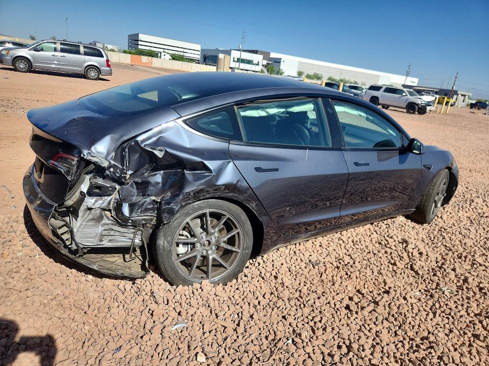 2023 Tesla Model 3 VIN 5YJ3E1EA3PF671809 COPART salvage auction — REAR END, AZ - CERT OF TITLE - SALVAGE, sold $4,450 on 2026-07-23 (photo 3)