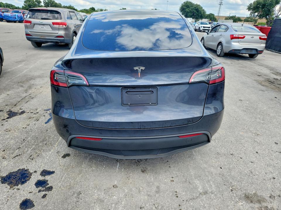 2024 Tesla Model y VIN 7SAYGDED5RF161043 COPART salvage auction — UNDERCARRIAGE, Fl - Certificate Of Title, sold $9,700 on 2026-07-21 (photo 6)