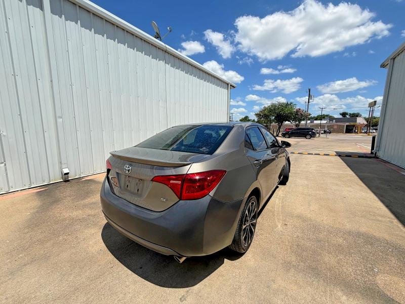 2017 Toyota Corolla VIN 5YFBURHE0HP631432 COPART salvage auction — MINOR DENT/SCRATCHES, Tx - Certificate Of Title (P), sold $3,450 on 2026-07-16 (photo 4)