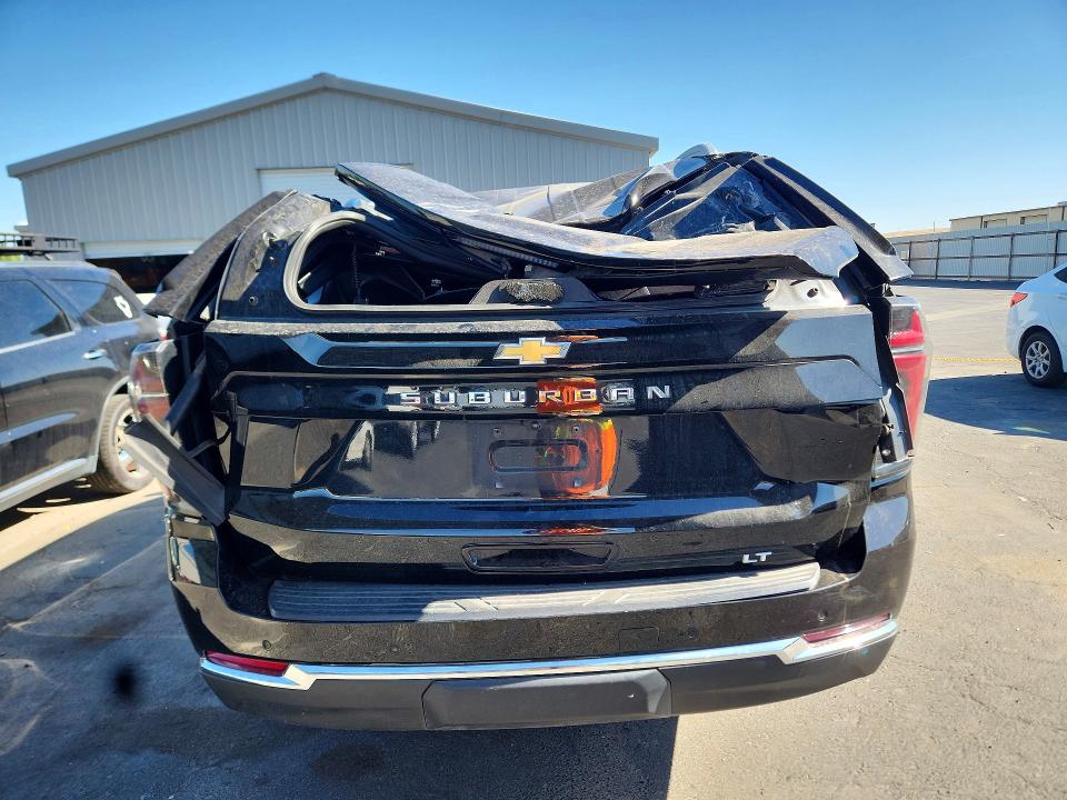 2025 Chevrolet Suburban VIN 1GNS5CRD0SR205132 COPART salvage auction — ROOF, Tx - Dis/Dlr/Exp Only Clean Title, sold $27,500 on 2026-07-29 (photo 6)