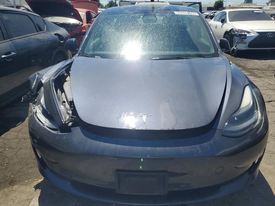2023 Tesla Model 3 VIN 5YJ3E1EAXPF447811 COPART salvage auction — FRONT END, CA - CERTIFICATE OF TITLE, sold $4,600 on 2026-07-20 (photo 5)