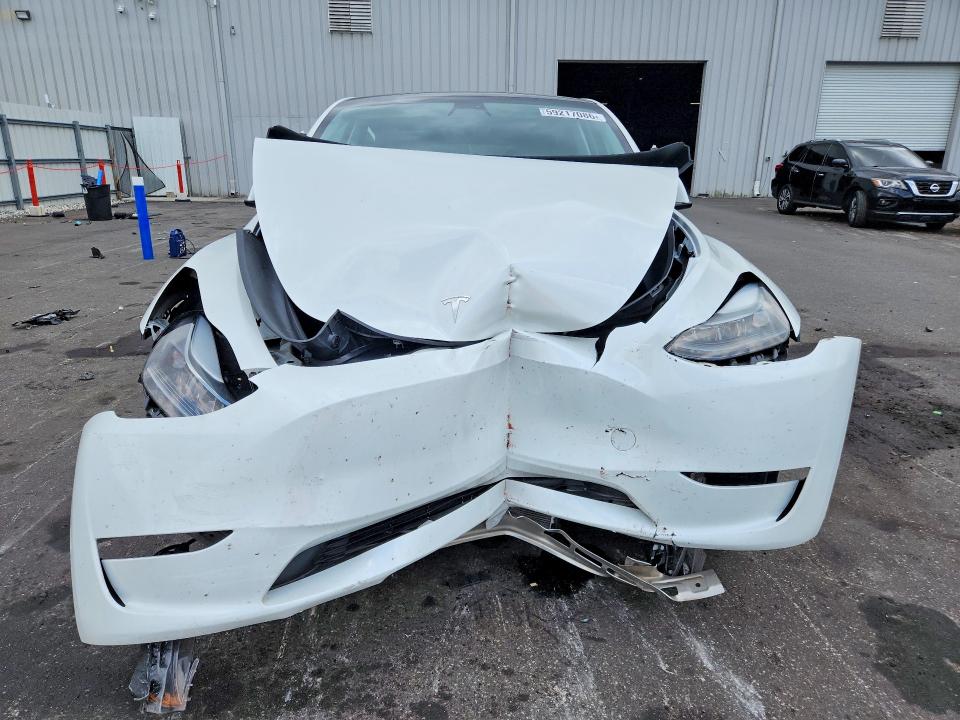 2023 Tesla VIN 7SAYGDEE7PF781348 COPART salvage auction — FRONT END, FL - CERT OF TITLE SLVG REBUILDABLE, sold $7,200 on 2026-07-22 (photo 5)