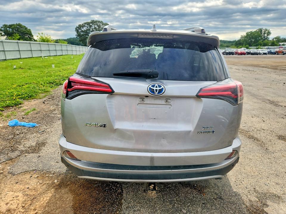 2017 Toyota Rav4 hybrid VIN JTMRJREV7HD101750 COPART salvage auction — ALL OVER, Wi - Junked Vehicle Bill Of Sale, sold $575 on 2026-07-28 (photo 6)
