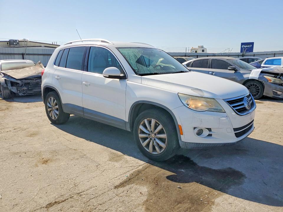 2011 Volkswagen Tiguan VIN WVGAV7AXXBW502181 COPART salvage auction — SIDE, CA - SALVAGE CERTIFICATE, sold $925 on 2026-08-14 (photo 4)