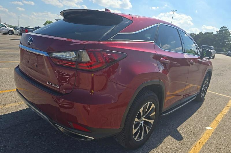 2020 Lexus Rx 350 VIN 2T2AZMDA7LC212209 COPART salvage auction — NORMAL WEAR, MO - CERTIFICATE OF TITLE (P), sold $15,700 on 2026-07-23 (photo 4)