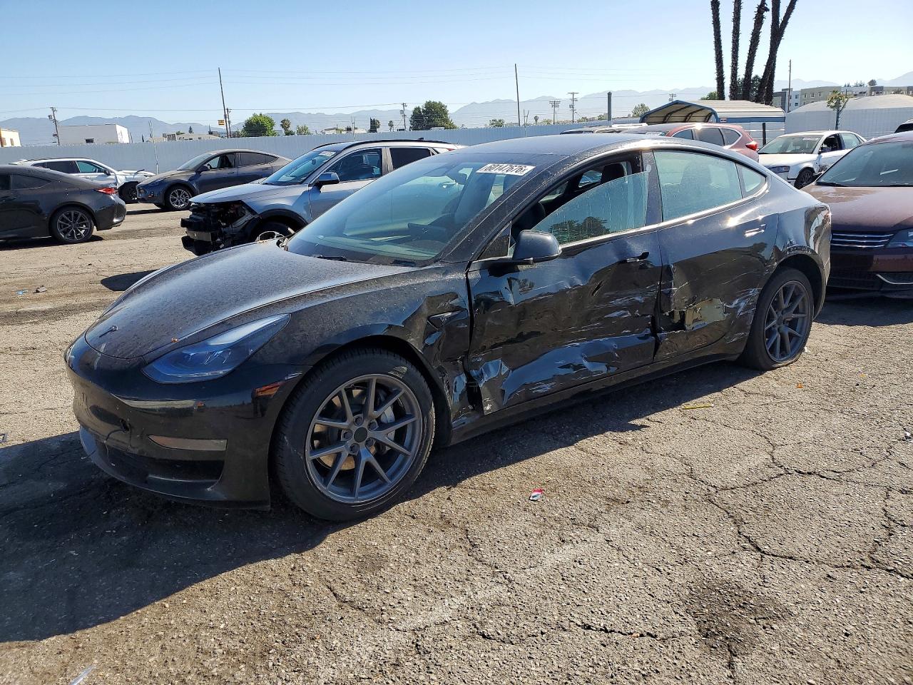 2023 Tesla Model 3 VIN 5YJ3E1EA7PF559207 — COPART salvage auction photo