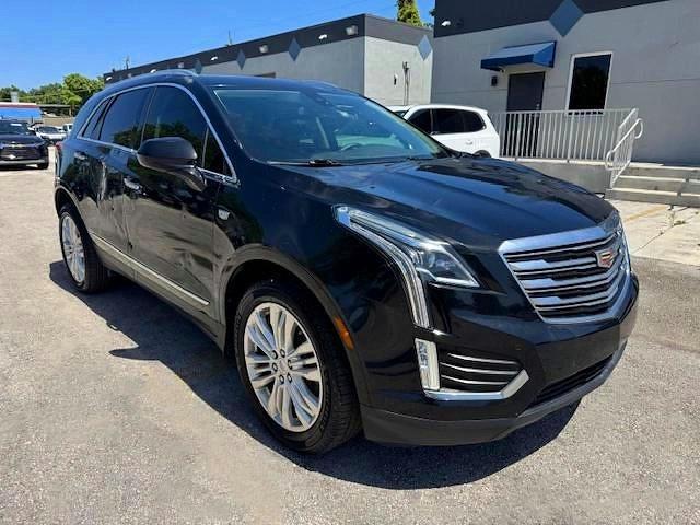 2018 Cadillac Xt5 VIN 1GYKNERS6JZ139813 COPART salvage auction — SIDE, Fl - Certificate Of Destruction (P), sold $5,600 on 2026-07-09 (photo 4)