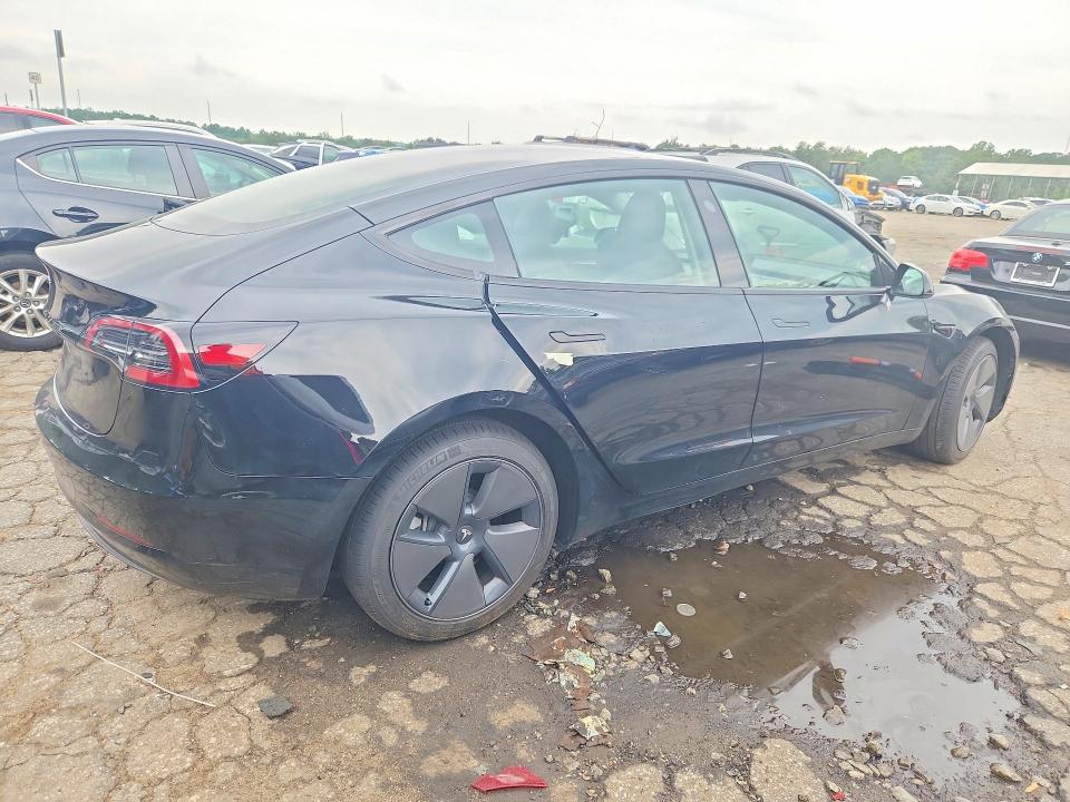 2023 Tesla Model 3 VIN 5YJ3E1EA9PF668011 COPART salvage auction — SIDE, Ga - Certificate Of Title, sold $14,600 on 2026-07-31 (photo 3)