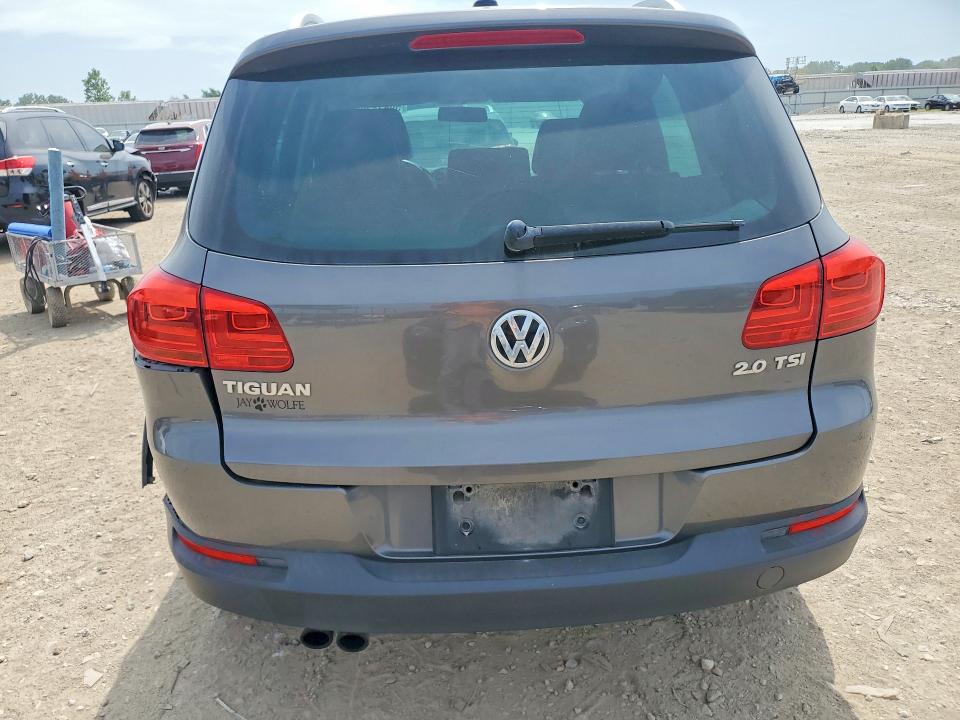 2012 Volkswagen Tiguan VIN WVGAV7AXXCW004158 COPART salvage auction — SIDE, Ks - Cert Of Title-Salvage, sold $1,100 on 2026-08-11 (photo 6)