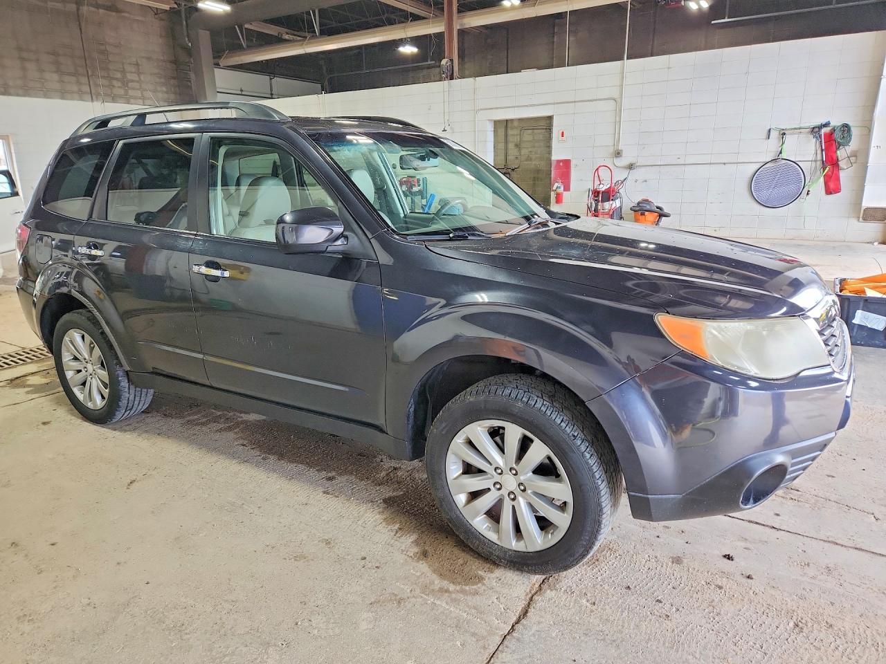 2011 Subaru Forester VIN JF2SHBEC2BH708725 COPART salvage auction — Minor Dent/Scratches, MN - CERTIFICATE OF TITLE, sold $650 on 2026-07-09 (photo 4)
