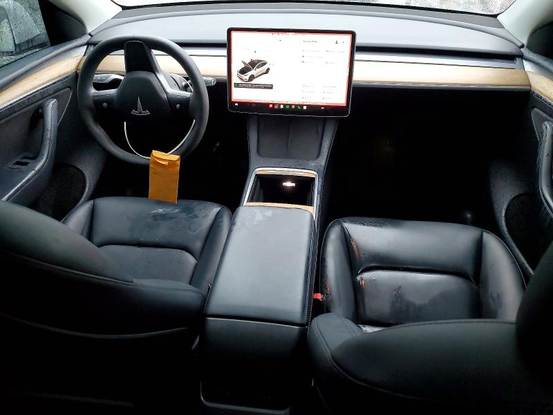 2022 Tesla Model y VIN 7SAYGDEEXNA017150 COPART salvage auction — ALL OVER, FL - CERT OF TITLE SLVG REBUILDABLE, sold $5,500 on 2026-07-24 (photo 8)