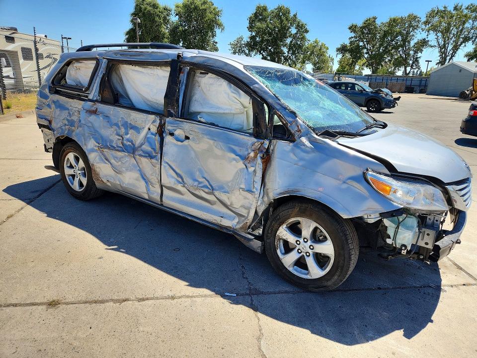 2015 Toyota Sienna VIN 5TDKK3DC2FS643609 COPART salvage auction — SIDE, Ca - Salvage Certificate, sold $525 on 2026-07-20 (photo 4)