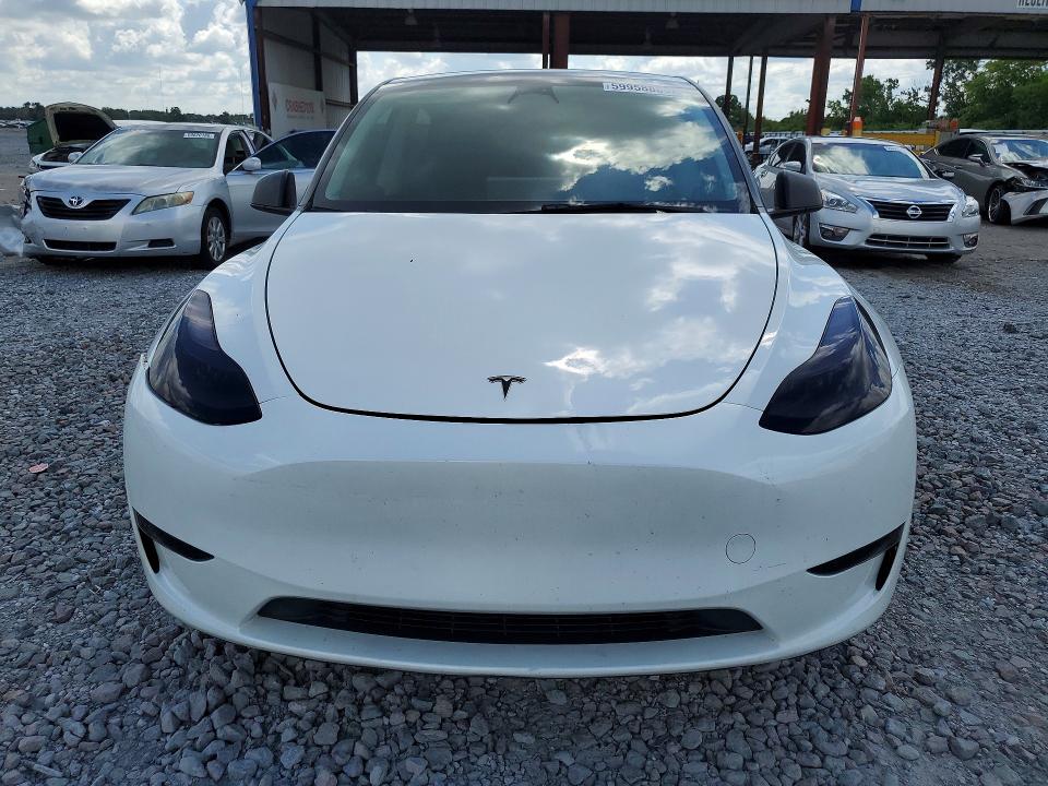 2023 Tesla Model y VIN 7SAYGDEE4PF608631 COPART salvage auction — SIDE, FL - CERT OF TITLE SLVG REBUILDABLE, sold $10,700 on 2026-07-31 (photo 5)