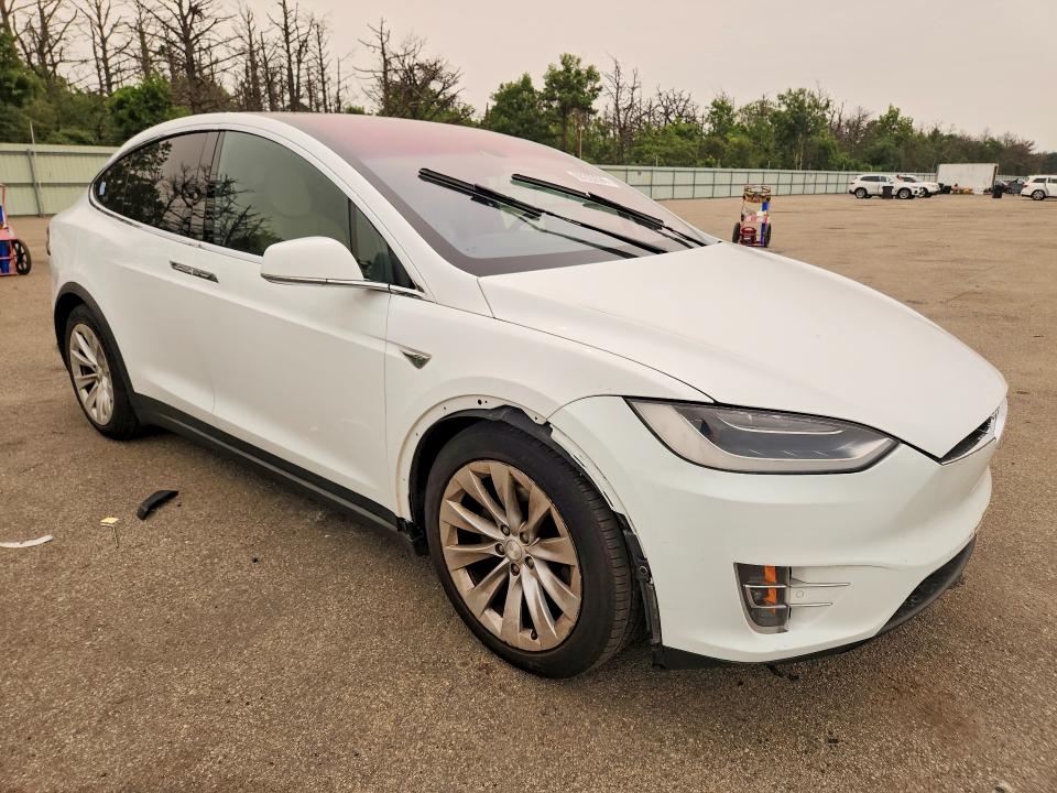 2016 Tesla Model x VIN 5YJXCBE28GF013425 COPART salvage auction — SIDE, Ny - Mv-907A Salvage Certificate, sold $6,600 on 2026-07-20 (photo 4)