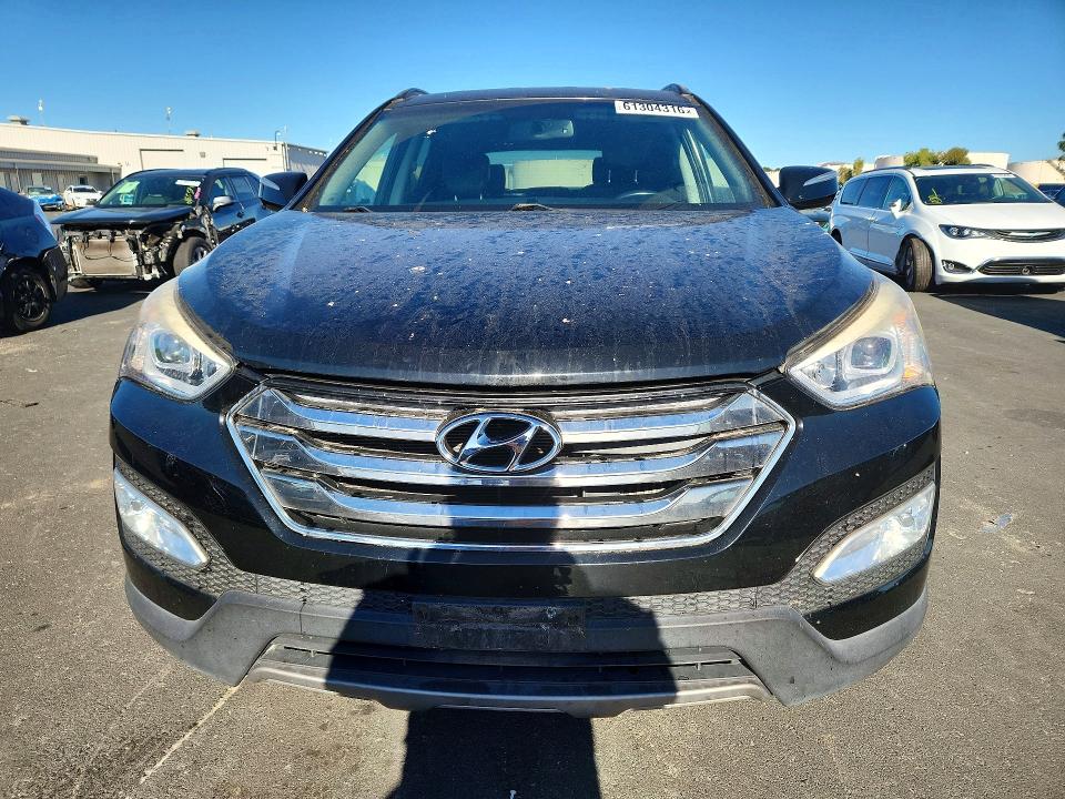 2014 Hyundai Santa fe VIN 5XYZU3LA5EG222200 COPART salvage auction — MINOR DENT/SCRATCHES, CA - DIS/DLR/EXP ONLY CLEAN TITLE, sold $850 on 2026-07-27 (photo 5)