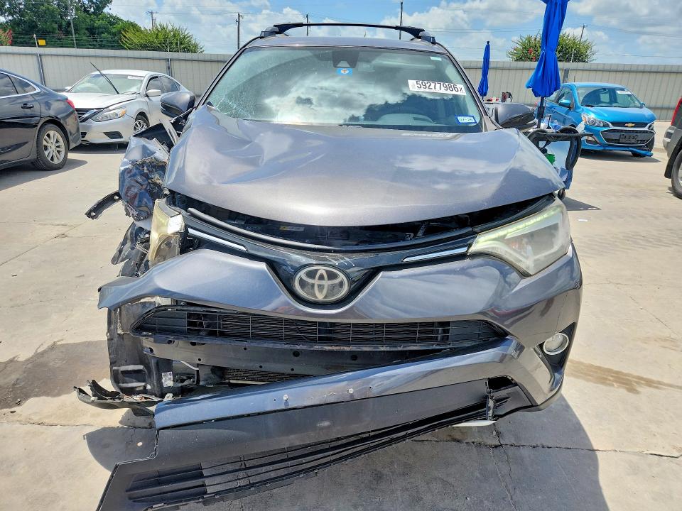 2018 Toyota Rav 4 VIN JTMYFREV7JJ169194 COPART salvage auction — FRONT END, Tx - Salvage Vehicle Title, sold $7,600 on 2026-07-16 (photo 5)