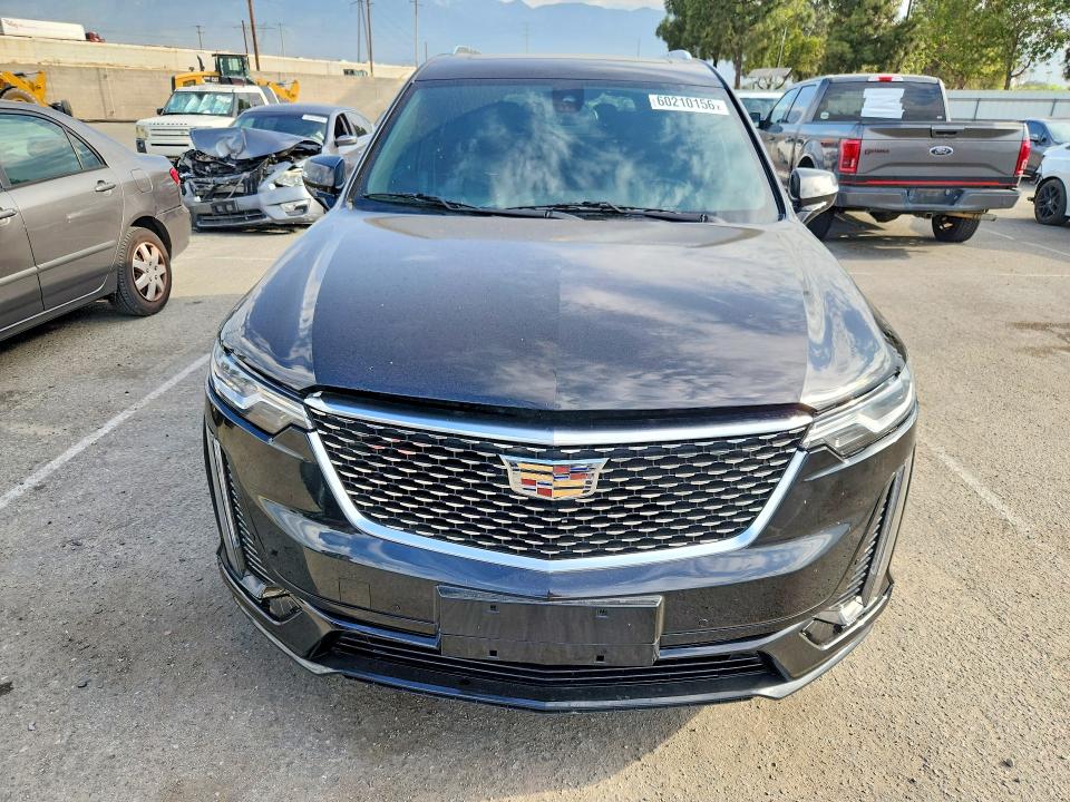 2021 Cadillac Xt6 VIN 1GYKPDRS1MZ226866 COPART salvage auction — REAR END, Tx - Salvage Vehicle Title (P), sold $9,600 on 2026-07-28 (photo 5)