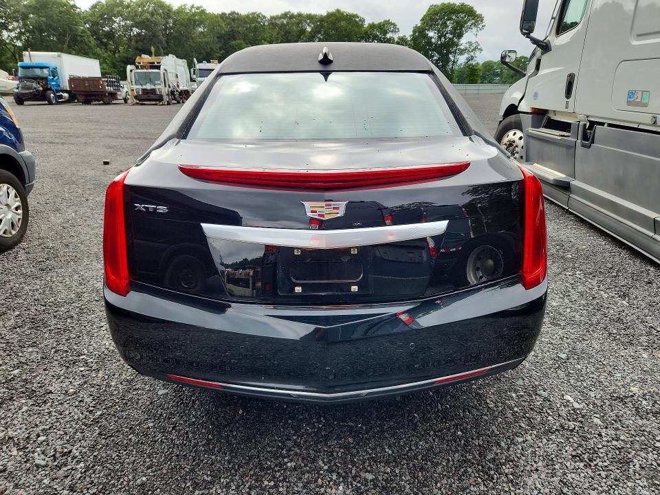 2017 Cadillac Xts VIN 2GEXG6U30H9550339 COPART salvage auction — MINOR DENT/SCRATCHES, MA - CERTIFICATE OF TITLE, sold $9,000 on 2026-08-11 (photo 6)
