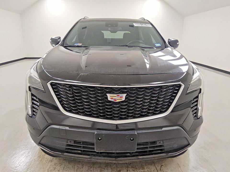 2021 Cadillac Xt4 VIN 1GYFZER40MF001004 COPART salvage auction — MINOR DENT/SCRATCHES, TX - CERTIFICATE OF TITLE, sold $11,400 on 2026-08-20 (photo 5)