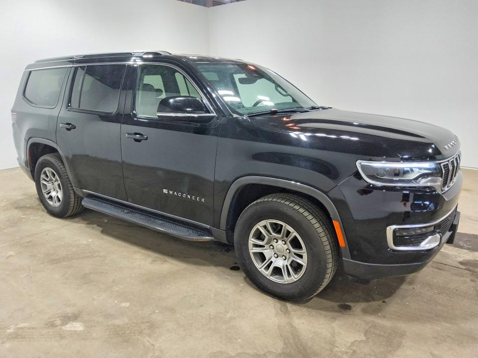 2022 Jeep Wagoneer VIN 1C4SJVATXNS184256 COPART salvage auction — MINOR DENT/SCRATCHES, Il - Certificate Of Title, sold $28,250 on 2026-08-27 (photo 4)