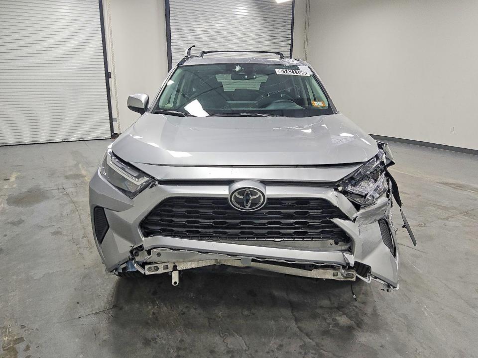 2025 Toyota Rav4 hybrid VIN JTMRWRFV5SJ079997 COPART salvage auction — ALL OVER, Nh - Certificate Of Title, sold $6,700 on 2026-07-28 (photo 5)
