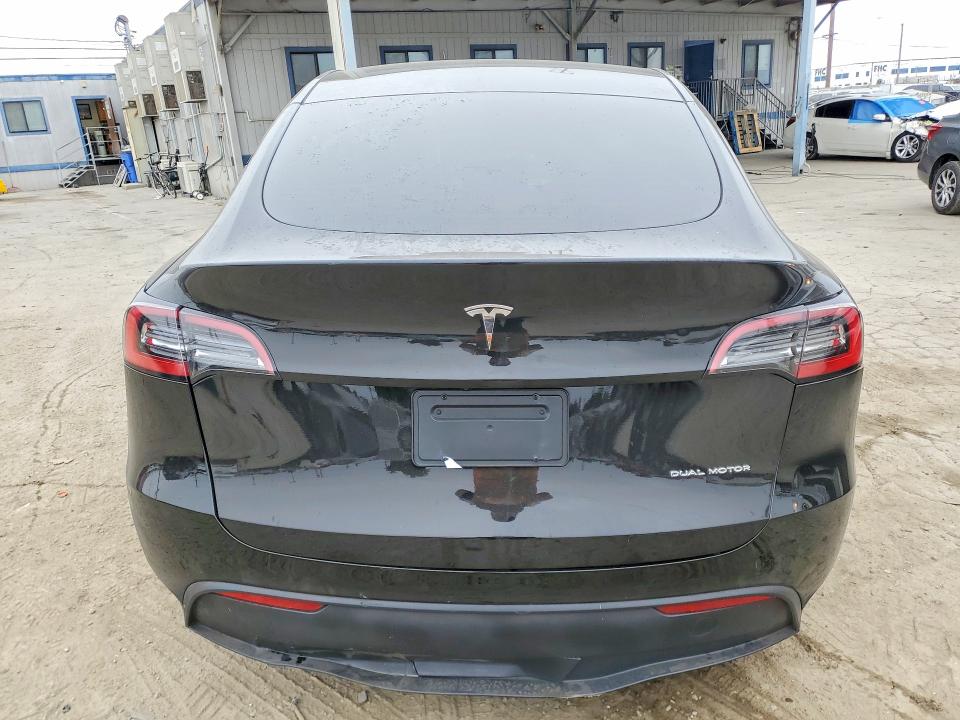 2023 Tesla Model y VIN 7SAYGDEE0PA109905 COPART salvage auction — SIDE, Ca - Salvage Certificate, sold $8,100 on 2026-09-01 (photo 6)
