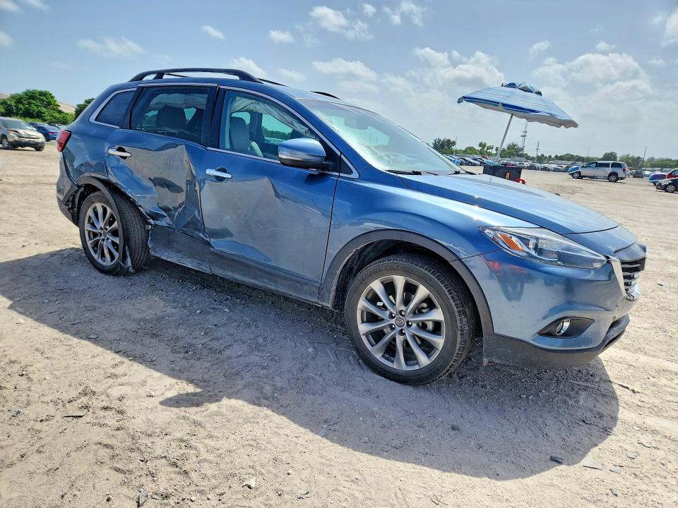 2015 Mazda Cx-9 VIN JM3TB2DA8F0469682 COPART salvage auction — SIDE, Fl - Cert Of Title Slvg Rebuildable, sold $250 on 2026-07-23 (photo 4)