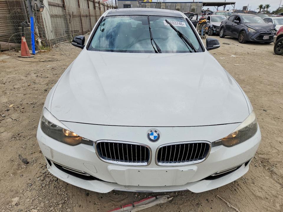 2012 BMW 3er VIN WBA3A5C59CF257333 COPART salvage auction — FRONT END, Ca - Dlr/Dis/Exp Only Salvage Title, sold $1,150 on 2026-07-09 (photo 5)