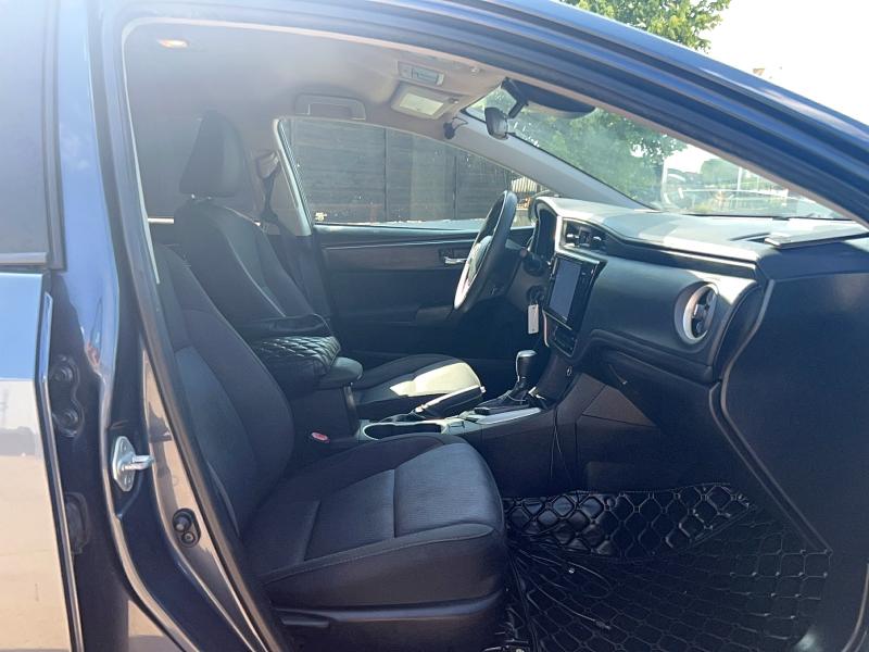 2017 Toyota Corolla VIN 5YFBURHE7HP640550 COPART salvage auction — MINOR DENT/SCRATCHES, TX - CERTIFICATE OF TITLE (P), sold $3,550 on 2026-07-27 (photo 5)