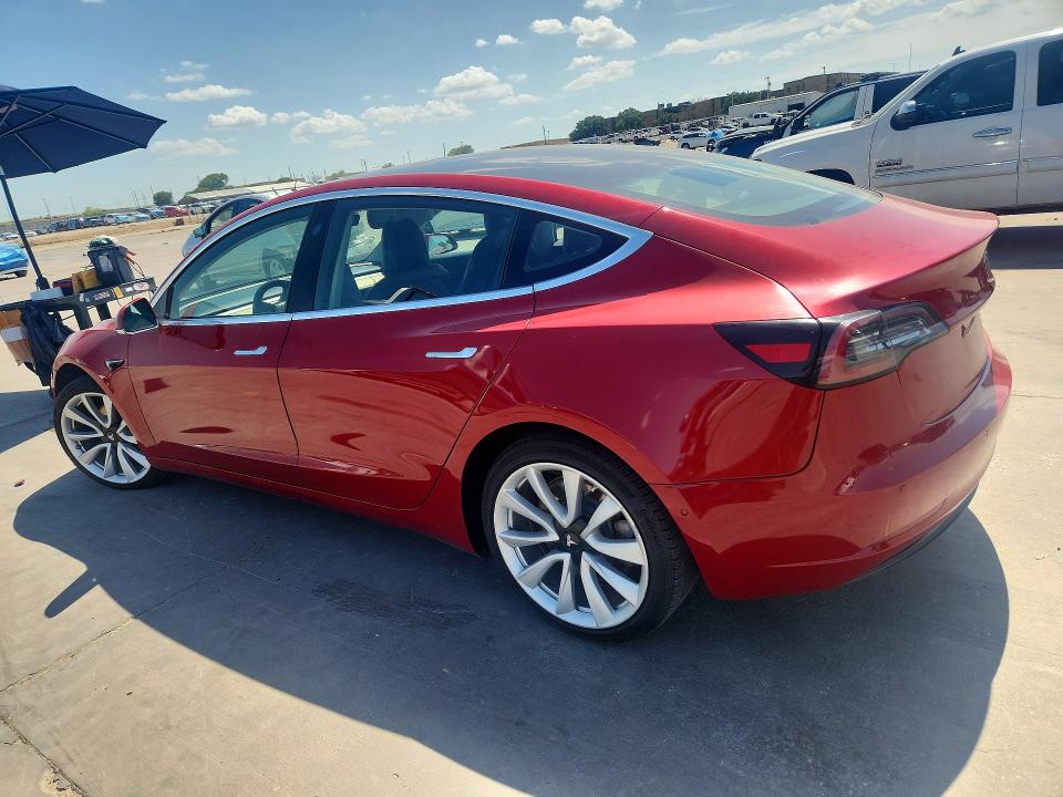 2018 Tesla Model 3 VIN 5YJ3E1EA4JF102961 COPART salvage auction — NORMAL WEAR, Tx - Cert Of Title-Rebuilt Salvage (P), sold $2,300 on 2026-07-21 (photo 2)
