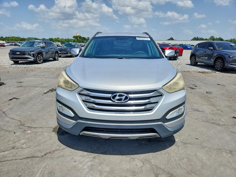 2014 Hyundai Santa fe VIN 5XYZU3LA4EG159946 COPART salvage auction — MINOR DENT/SCRATCHES, Fl - Certificate Of Title, sold $2,600 on 2026-07-20 (photo 5)