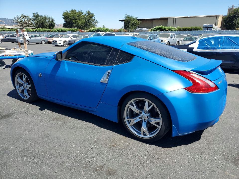 2011 Nissan 370z VIN JN1AZ4EHXBM551762 COPART salvage auction — VANDALISM, Fl - Dis/Dlr/Exp Only Salvage Title, sold $5,100 on 2026-07-28 (photo 2)