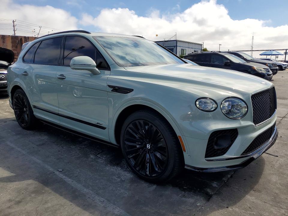 2023 Bentley Bentayga VIN SJAAR2ZVXPC023588 COPART salvage auction — REAR END, Ca - Salvage Certificate, sold $166,000 on 2026-09-23 (photo 4)