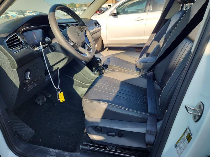 2023 Volkswagen Tiguan VIN 3VVNB7AX7PM101937 COPART salvage auction — SIDE, TX - SALVAGE VEHICLE TITLE (P), sold $10,600 on 2026-08-20 (photo 7)