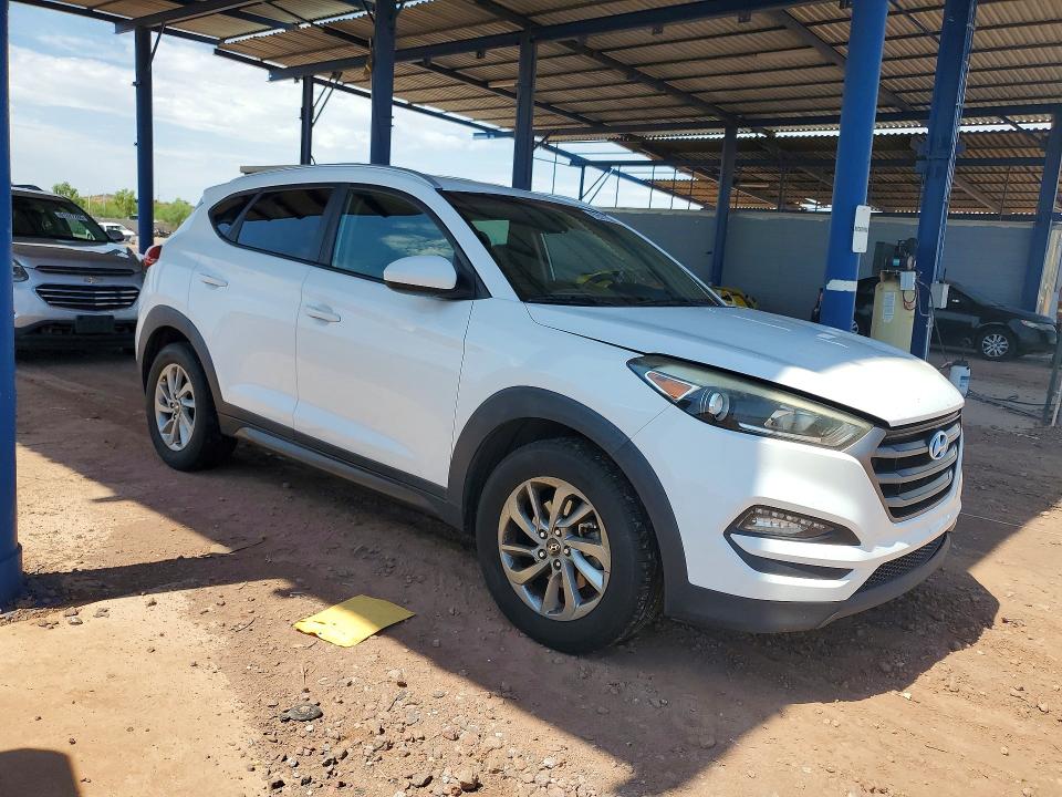 2016 Hyundai Tucson VIN KM8J33A48GU061545 COPART salvage auction — MINOR DENT/SCRATCHES, Az - Certificate Of Title, sold $1,600 on 2026-07-30 (photo 4)