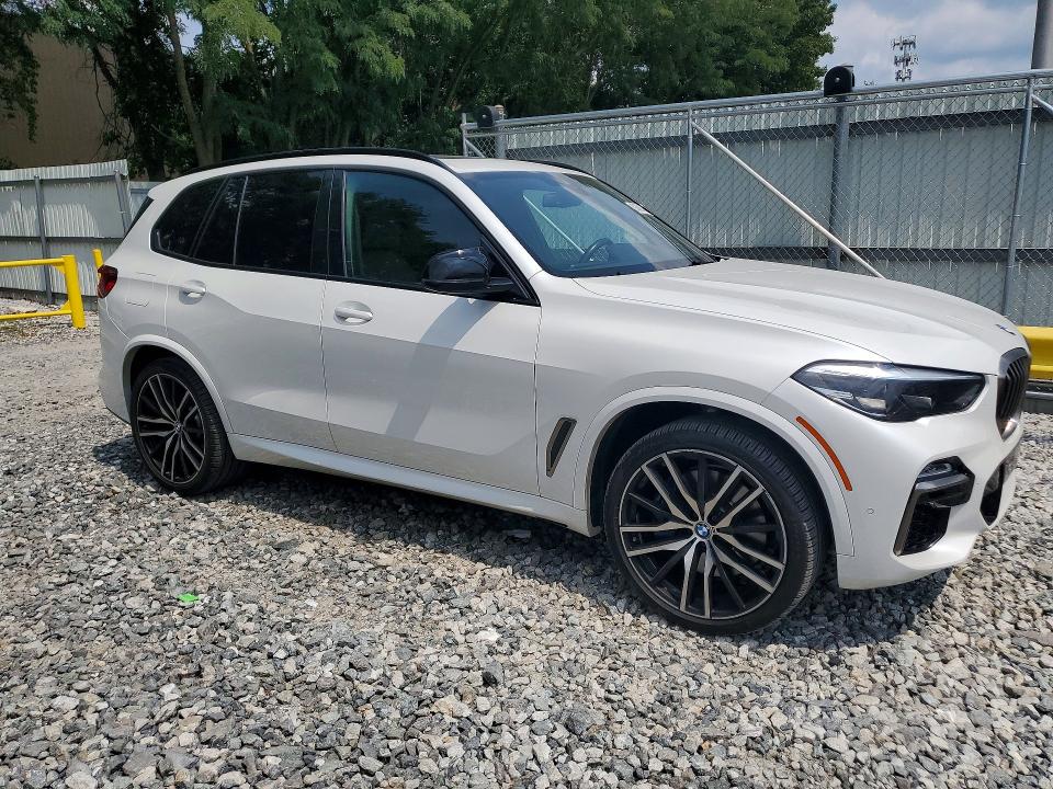 2020 BMW X5 VIN 5UXJU4C01LL227744 COPART salvage auction — NORMAL WEAR, Nc - Certificate Of Title (P), sold $26,000 on 2026-09-09 (photo 4)