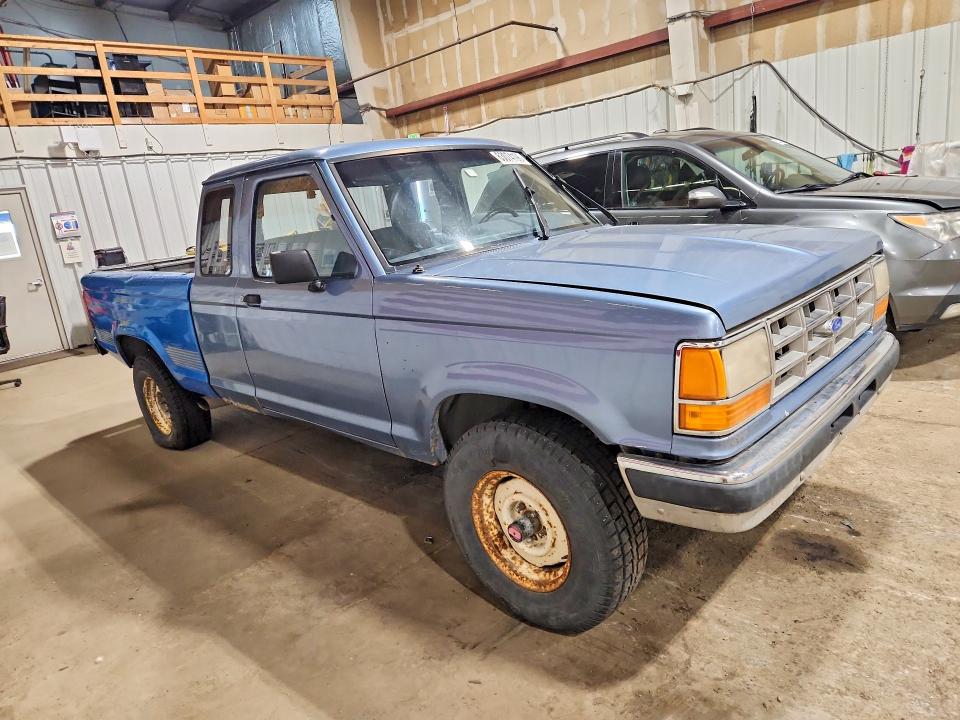1989 Ford Ranger VIN 1FTCR15T2KPA32065 COPART salvage auction — MINOR DENT/SCRATCHES, Ak - Cert Of Veh Title-Reconstructe, sold $450 on 2026-08-04 (photo 4)
