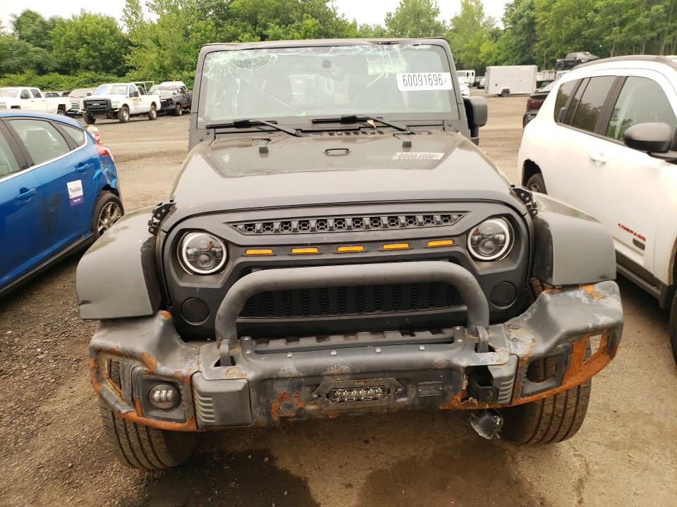 2013 Jeep Wrangler / VIN 1C4BJWEG2DL671317 COPART salvage auction — ROLLOVER, Ct - Cert Of Title-Salvage, sold $475 on 2026-07-24 (photo 5)